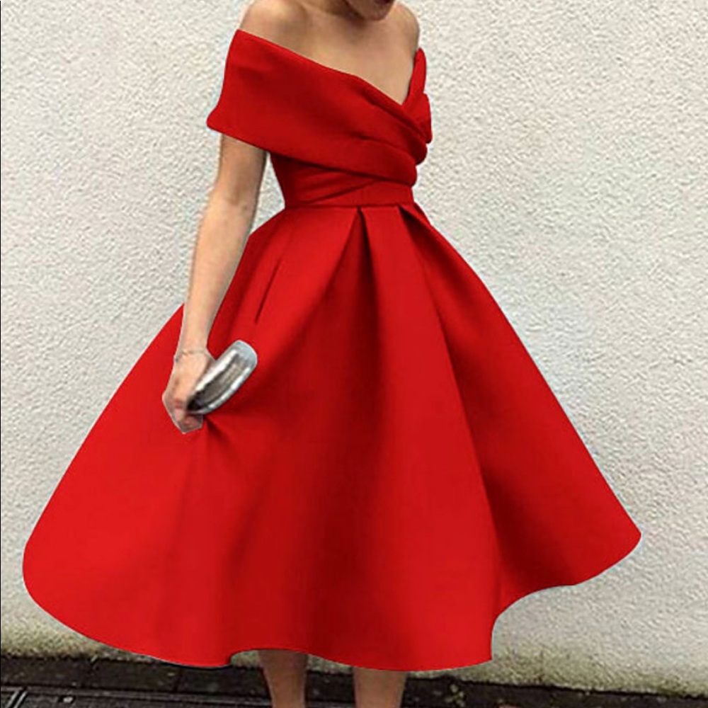 Dress is a 00 and has never been worn! Sizing chart and dress details included.